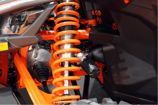 Orange automotive suspension that has been installed